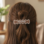 Close-up of hair clip set featuring wavy design detail