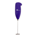 Whisk frother blending milk for creamy coffee foam