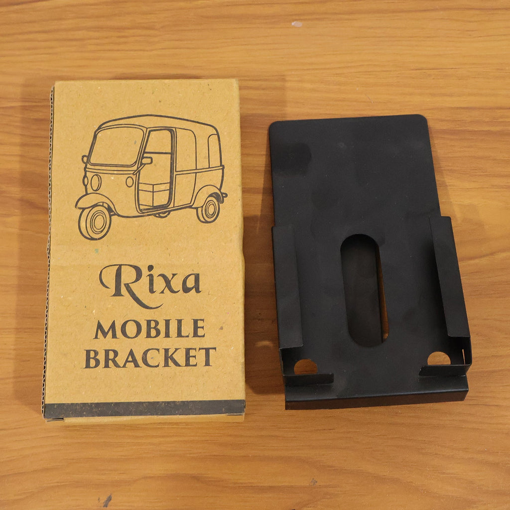 Mobile holder with smartphone mounted on dashboard
