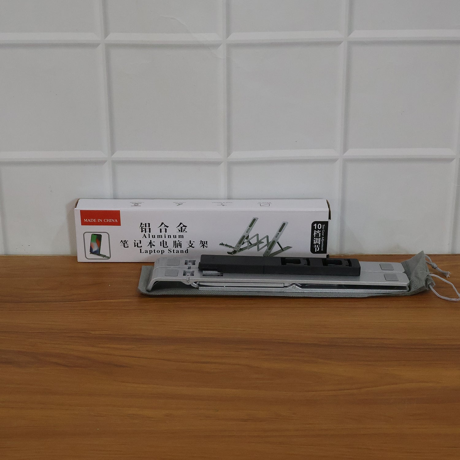 Multiple angle view of adjustable aluminium laptop stand