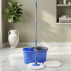 Mop bucket system with spin wringer and drainage feature