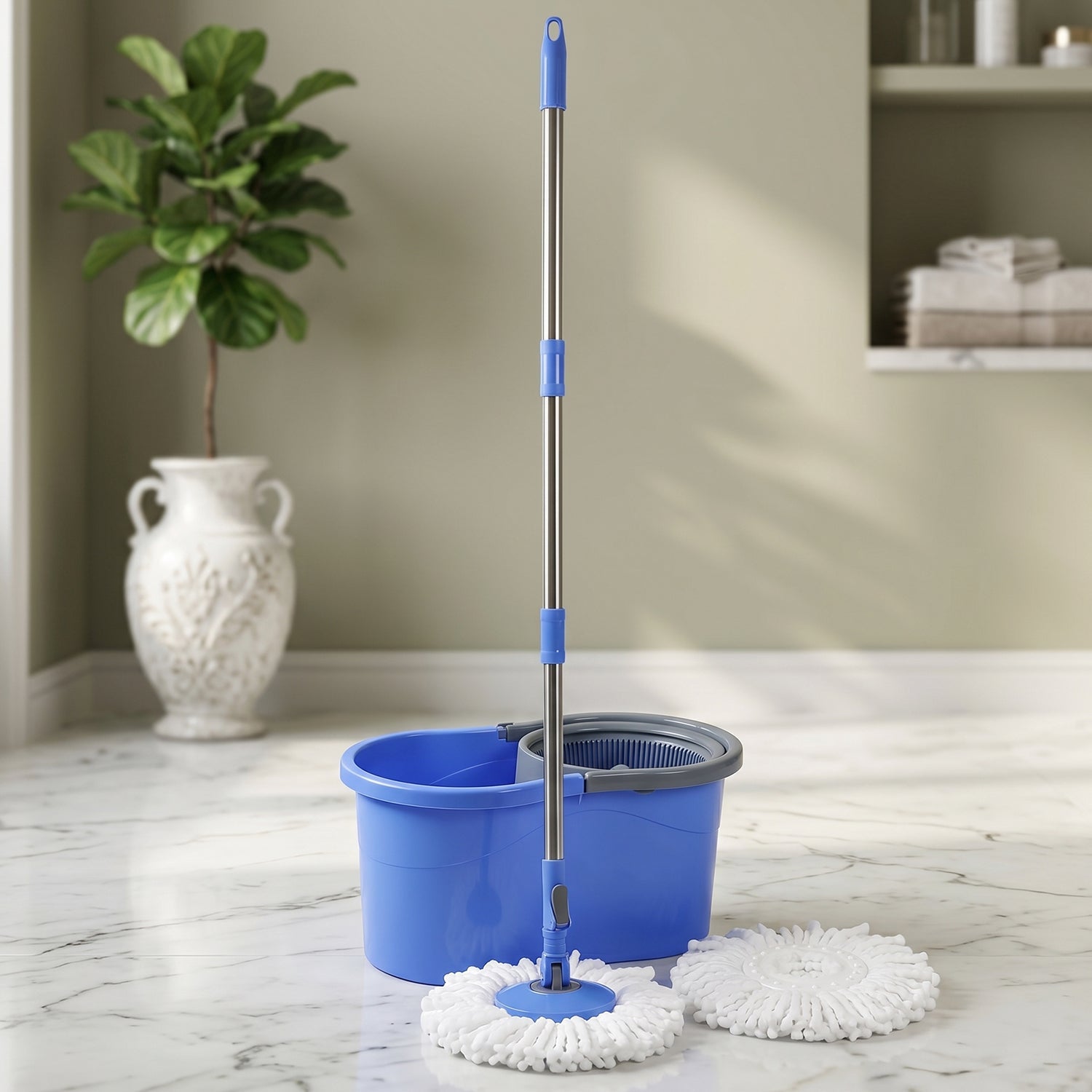 Mop bucket system with spin wringer and drainage feature