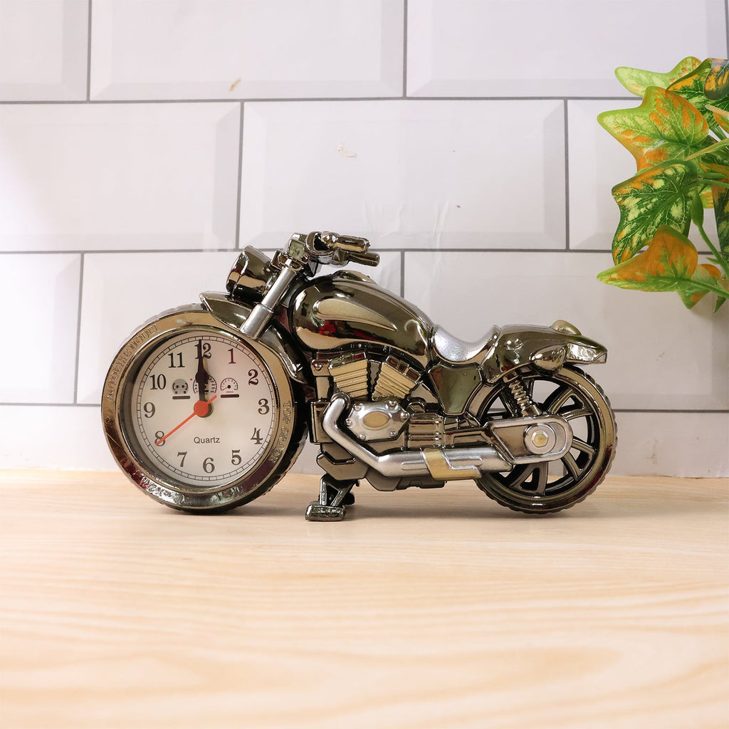 Close-up of motorcycle alarm clock face highlighting analog dial