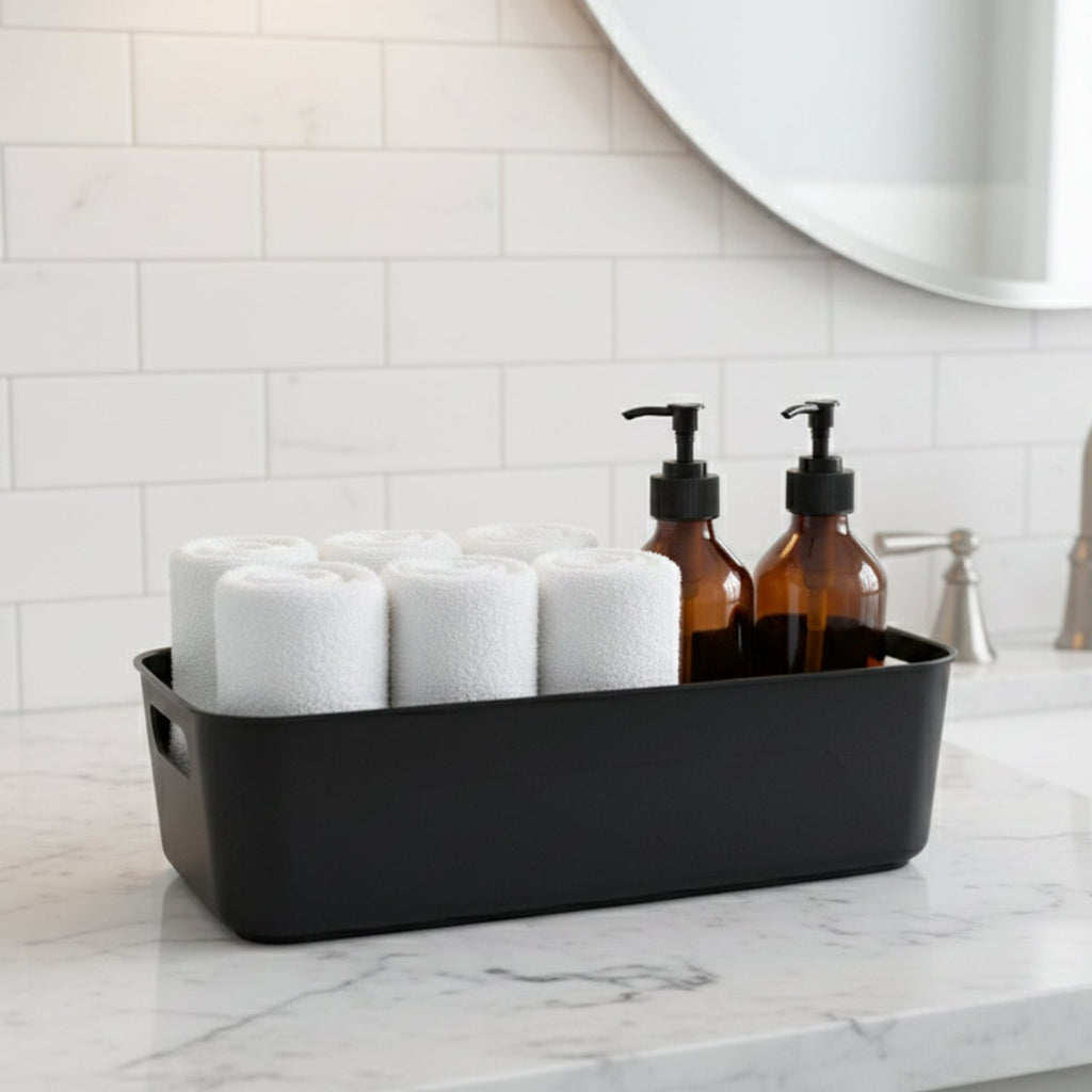 Side view of black plastic storage basket tray