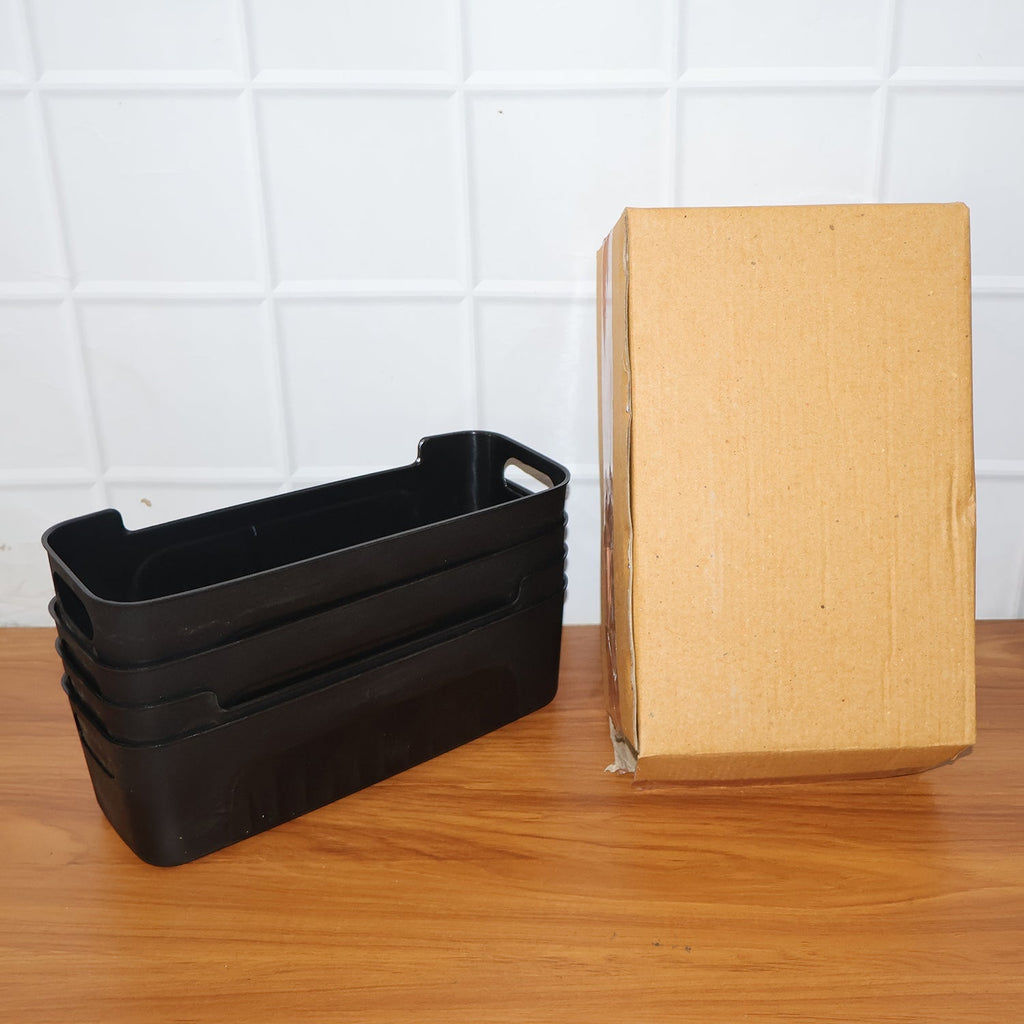 Black plastic storage baskets filled with organizing items