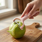 Compact ergonomic vegetable peeler with comfortable handle for effortless use