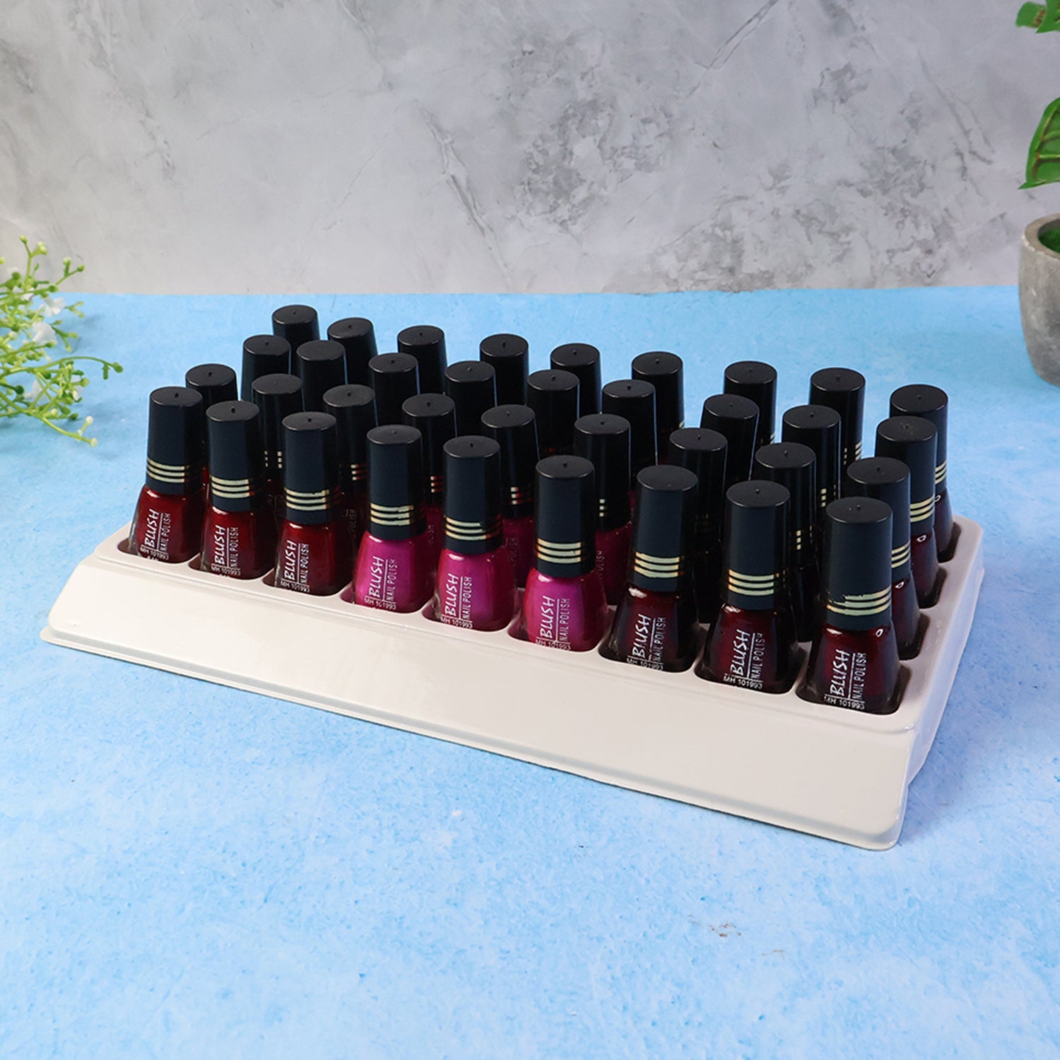 Clear blush nail polish bottle showcasing vibrant mix colors with glossy finish