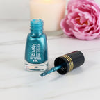 Metallic nail color bottle with shimmering glitter formula for vibrant nails