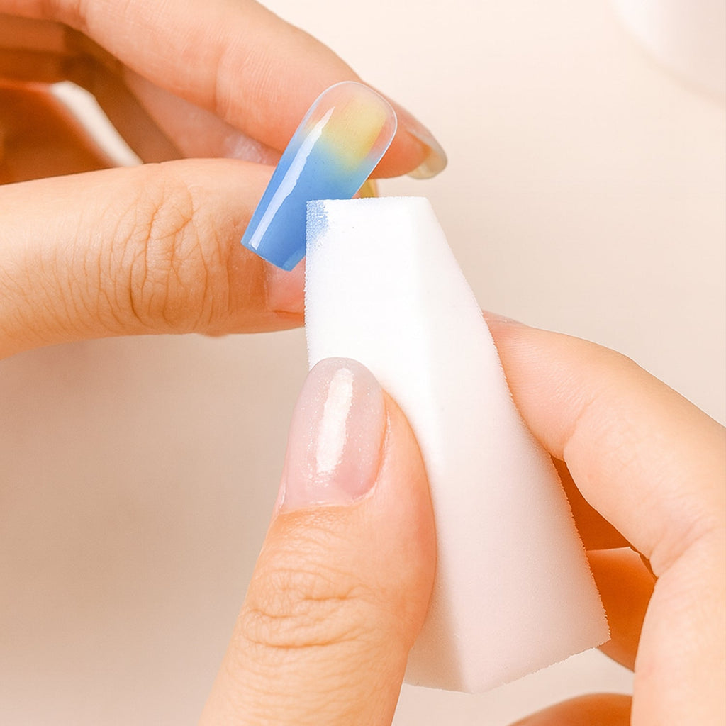 Close-up of rectangular nail buffer sponge for manicure