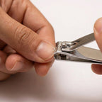Compact stainless steel nail clipper suitable for travel and home use
