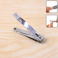 Stainless steel nail cutter with built-in file showing sharp blades and compact design