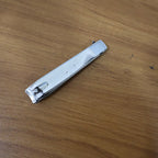 Stainless steel nail cutter in action, cutting nails precisely