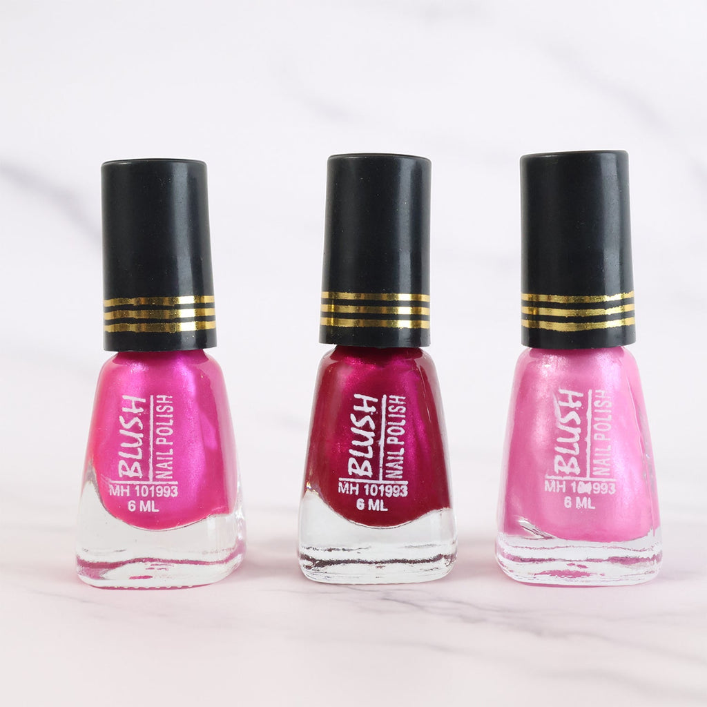 Metallic nail colour in dark mini nail polish bottle with glitter effect
