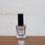 Fashionable nails painted with Metallic Gold Nail Polish, perfect for parties
