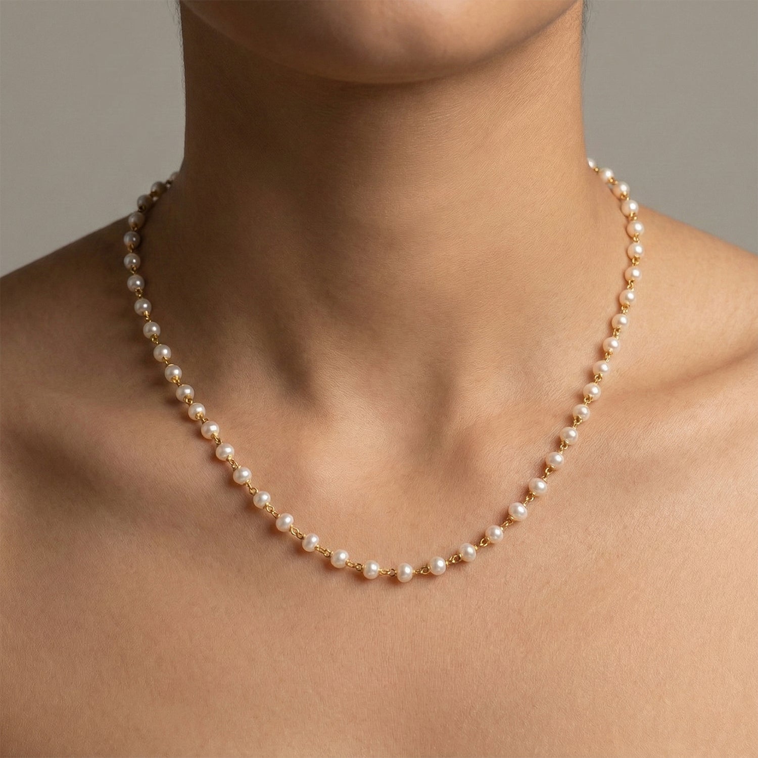 Long pearl beaded necklace for women with gold-tone chain