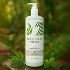 Neem & Tulsi Face Wash bottle with fresh neem and tulsi background