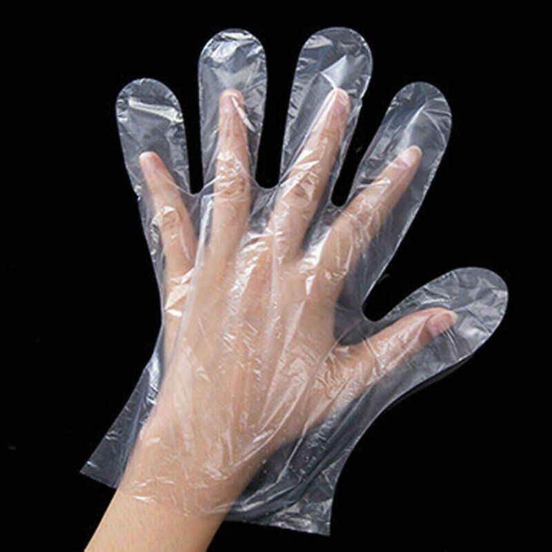 Detailed shot of the label on a pack of Grow Wear transparent disposable clear gloves.