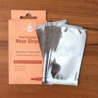 Unlabeled charcoal nose strips ready for use