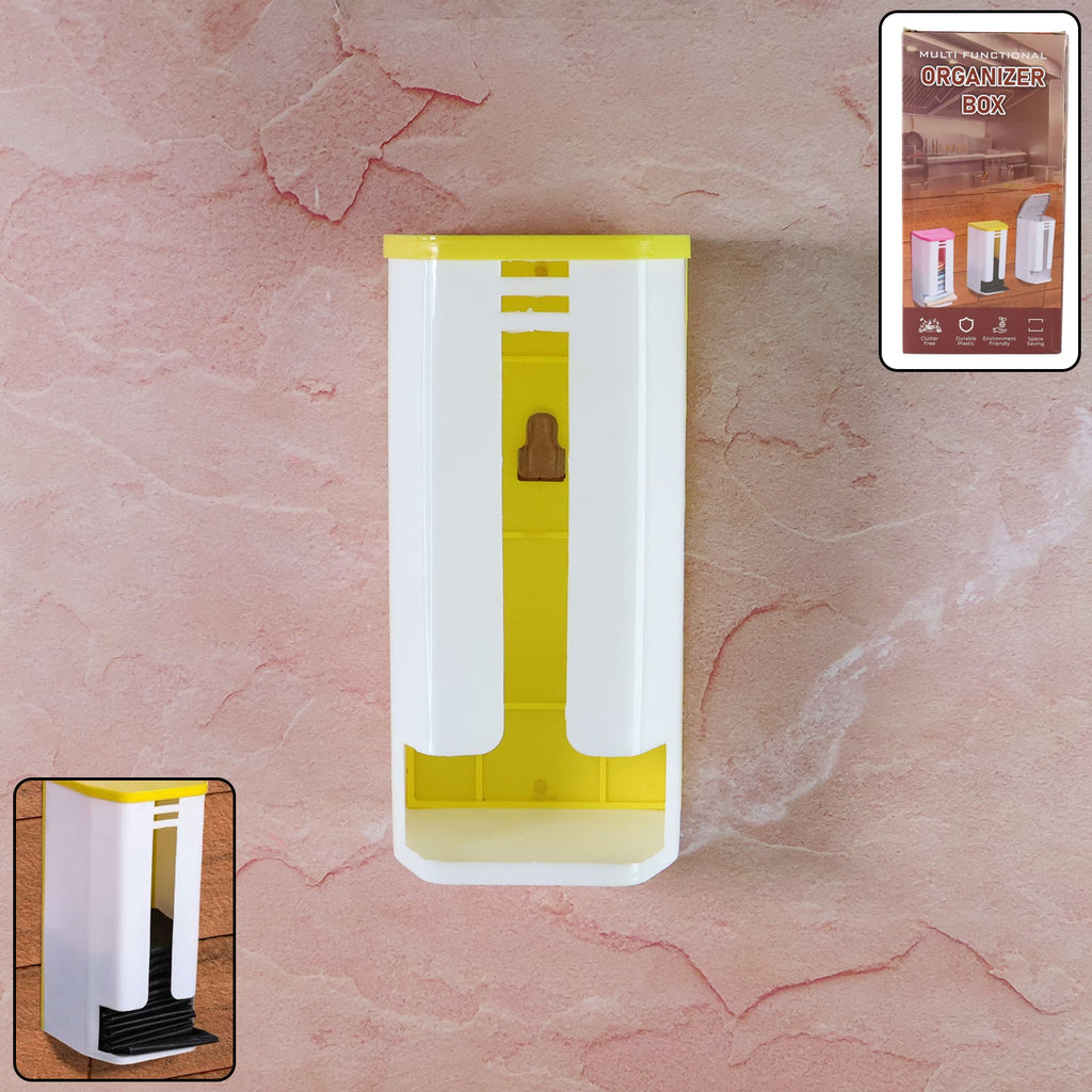 Wall-mounted plastic bag dispenser neatly installed in a modern kitchen.