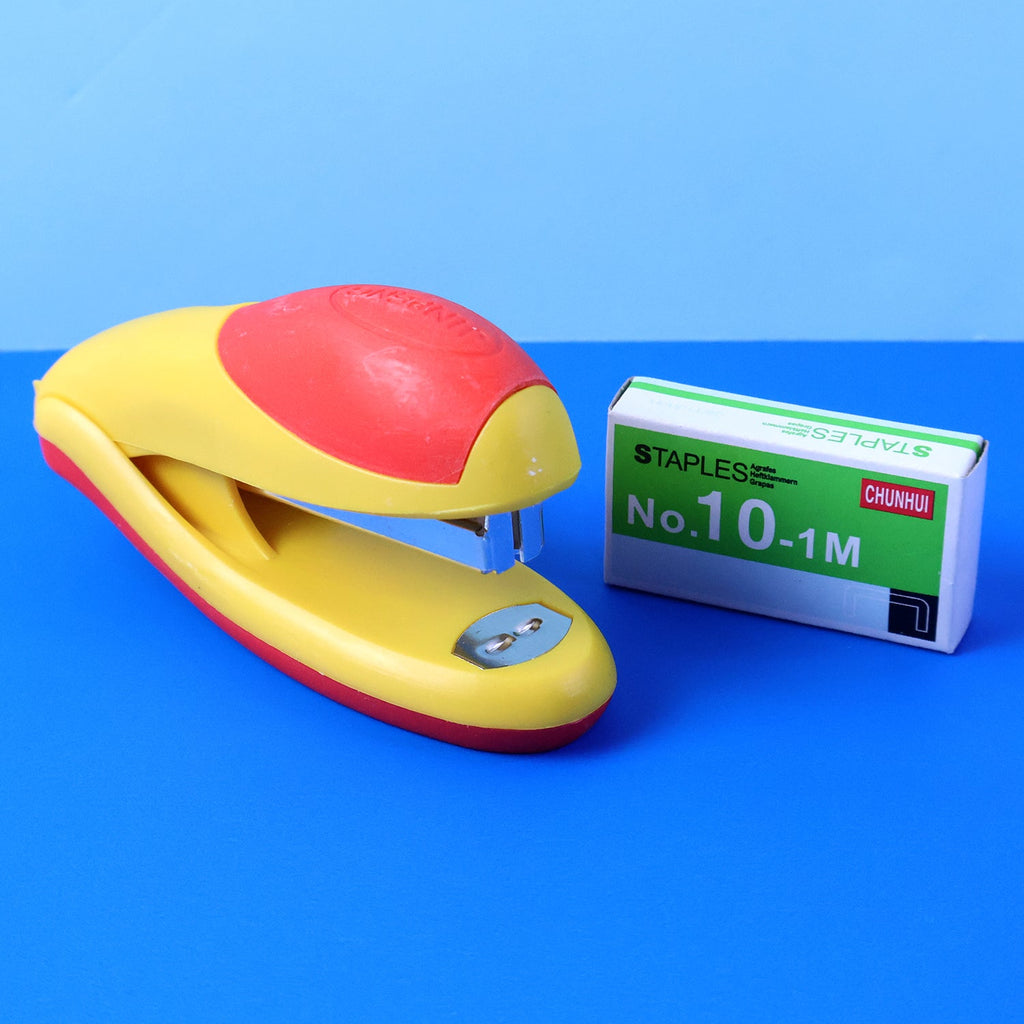 Handheld heavy-duty stapler with ergonomic grip for comfortable use