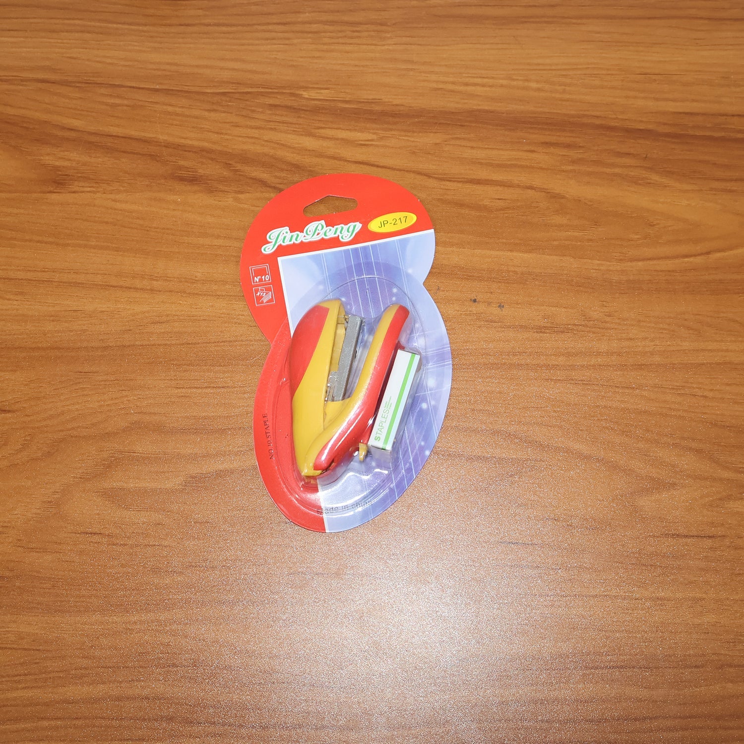 Heavy-duty desktop stapler resting steadily on an office desk