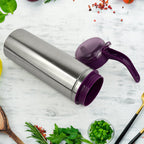Top view showing flip-open lid of stainless steel oil pourer
