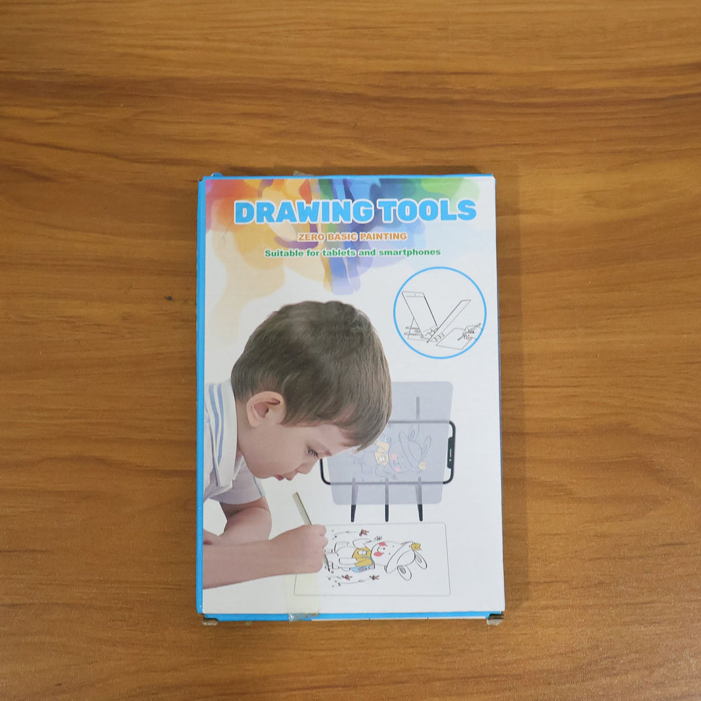 Kids using the mobile phone drawing projector board for sketching and tracing