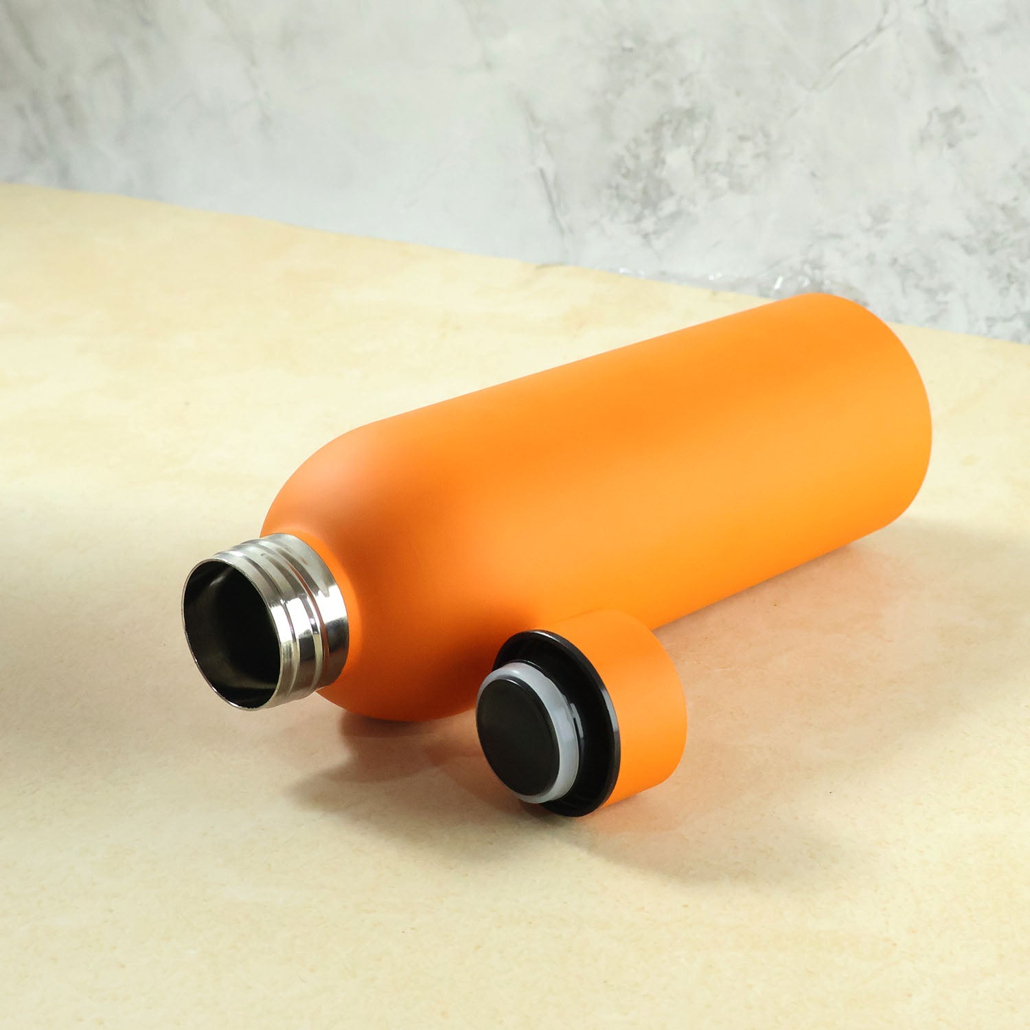 Orange insulated water bottle for daily hydration use
