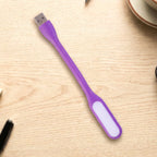 Flexible USB LED Light positioned precisely over a laptop keyboard.