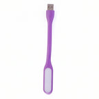 Purple USB-powered LED light effectively illuminating a compact workspace.