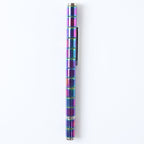 The magnetic pen creatively arranged into various abstract shapes on a desk.