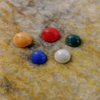Natural Panch Ratna stones glowing with inherent colors, promoting positivity.