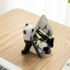 Desk phone holder with panda design
