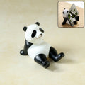 Cute panda mobile phone stand holder on desk