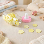 Compact baby bottle soap paper container held in hand showing portability