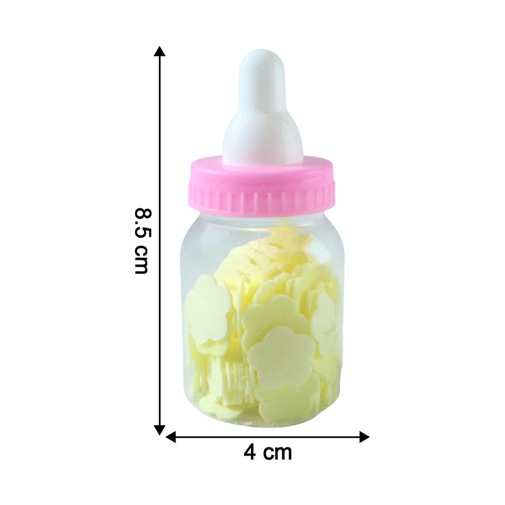 Soap paper sheets in baby bottle container beside a cup of water for use