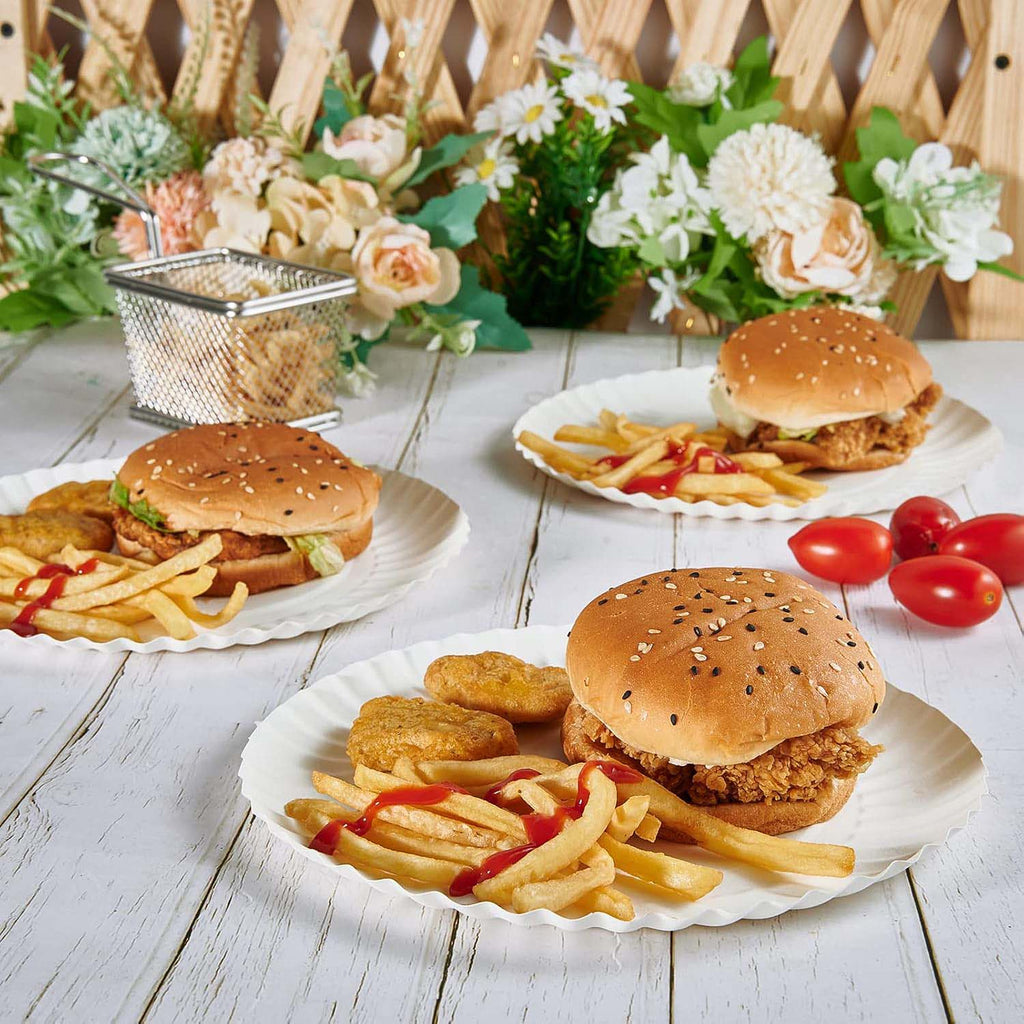 Package showing Freshee 25-pack compostable paper plates with clear eco-friendly branding.