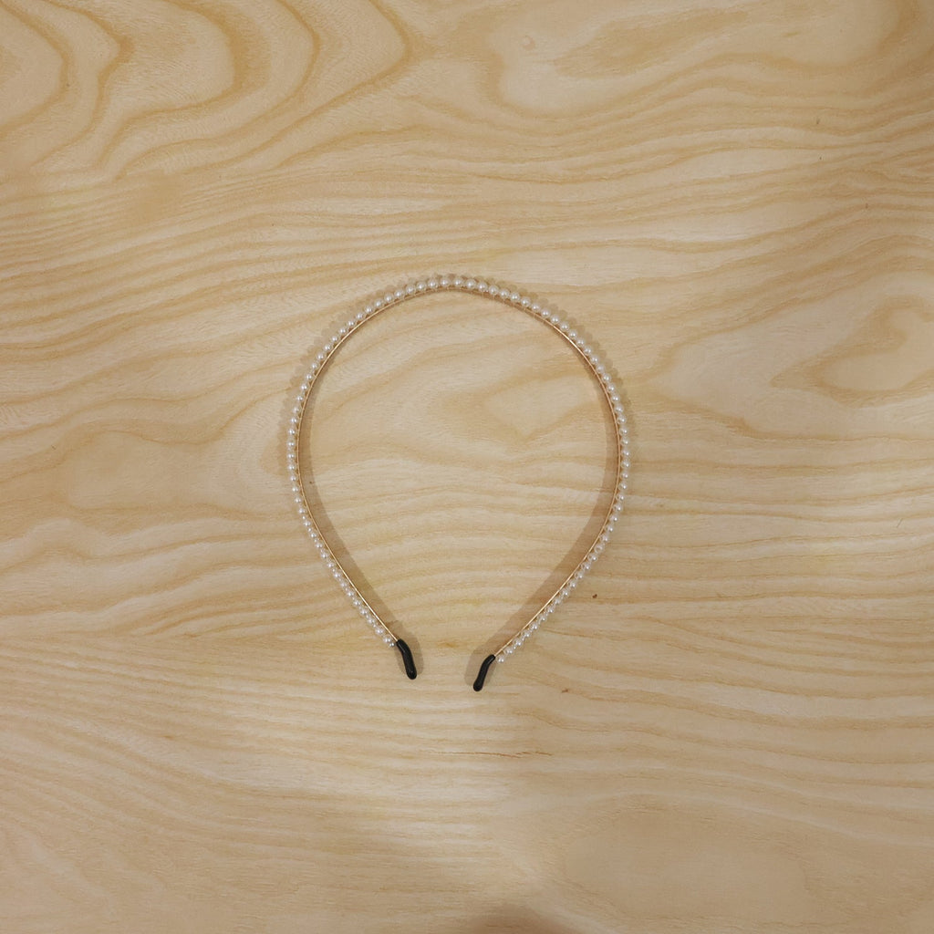 Versatile pearl hairband for casual and festive styling