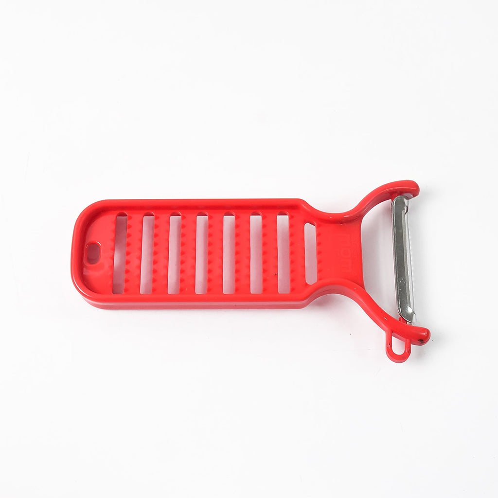 Vibrant red compact ginger grater and peeler by Supermom