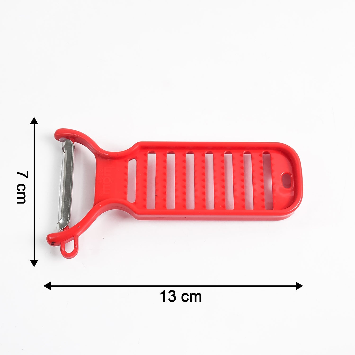 Close-up view of stainless steel grater and peeler for ginger