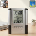 Digital desk clock with pen holder on workspace