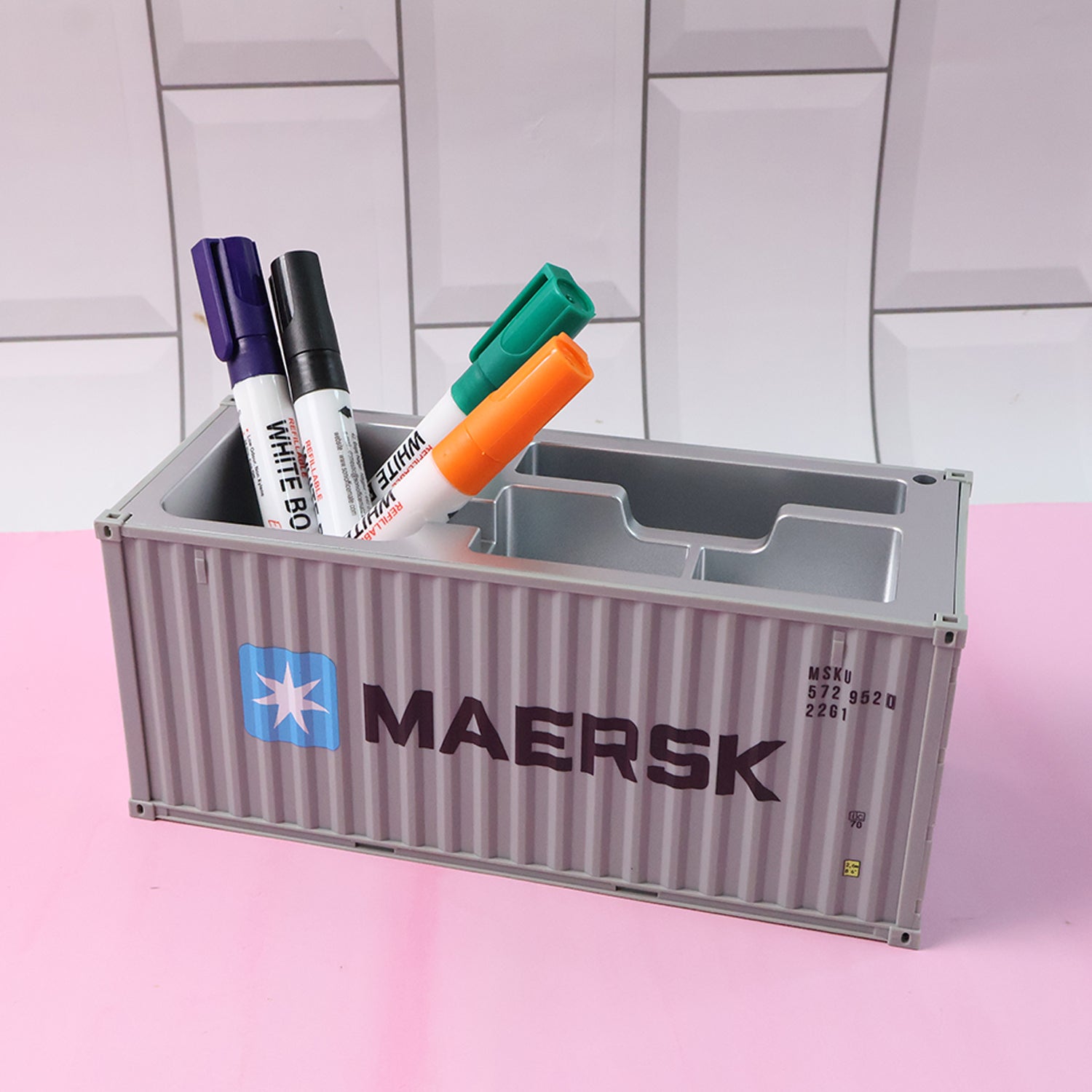 Container-style pen holder with organized compartments for stationery