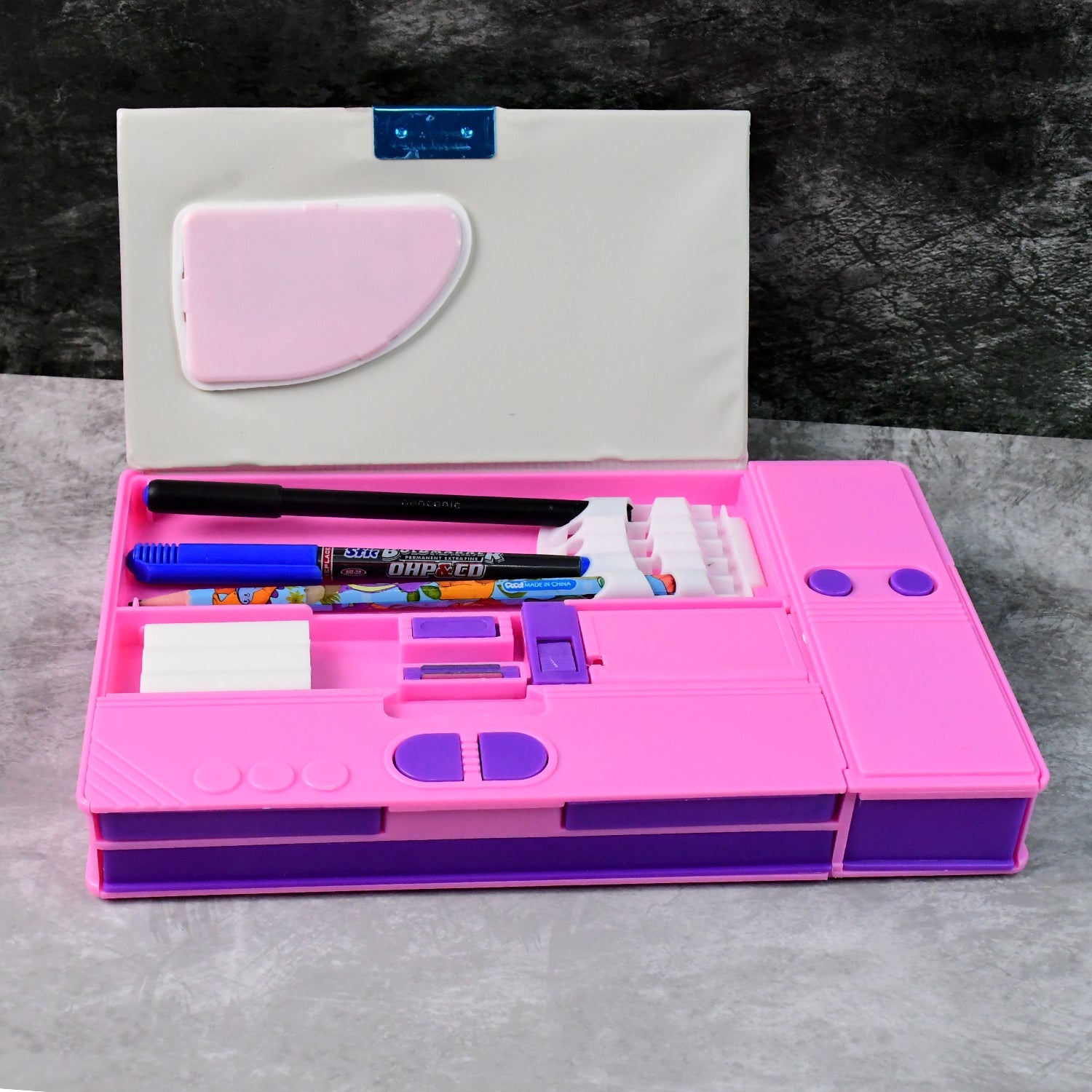 Close-up of magnetic closure on space-themed pencil box with calculator