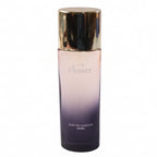 Flower Eau De Parfum bottle with floral cap and design