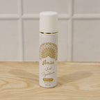Detailed view of Signature Aman men's fragrance spray bottle