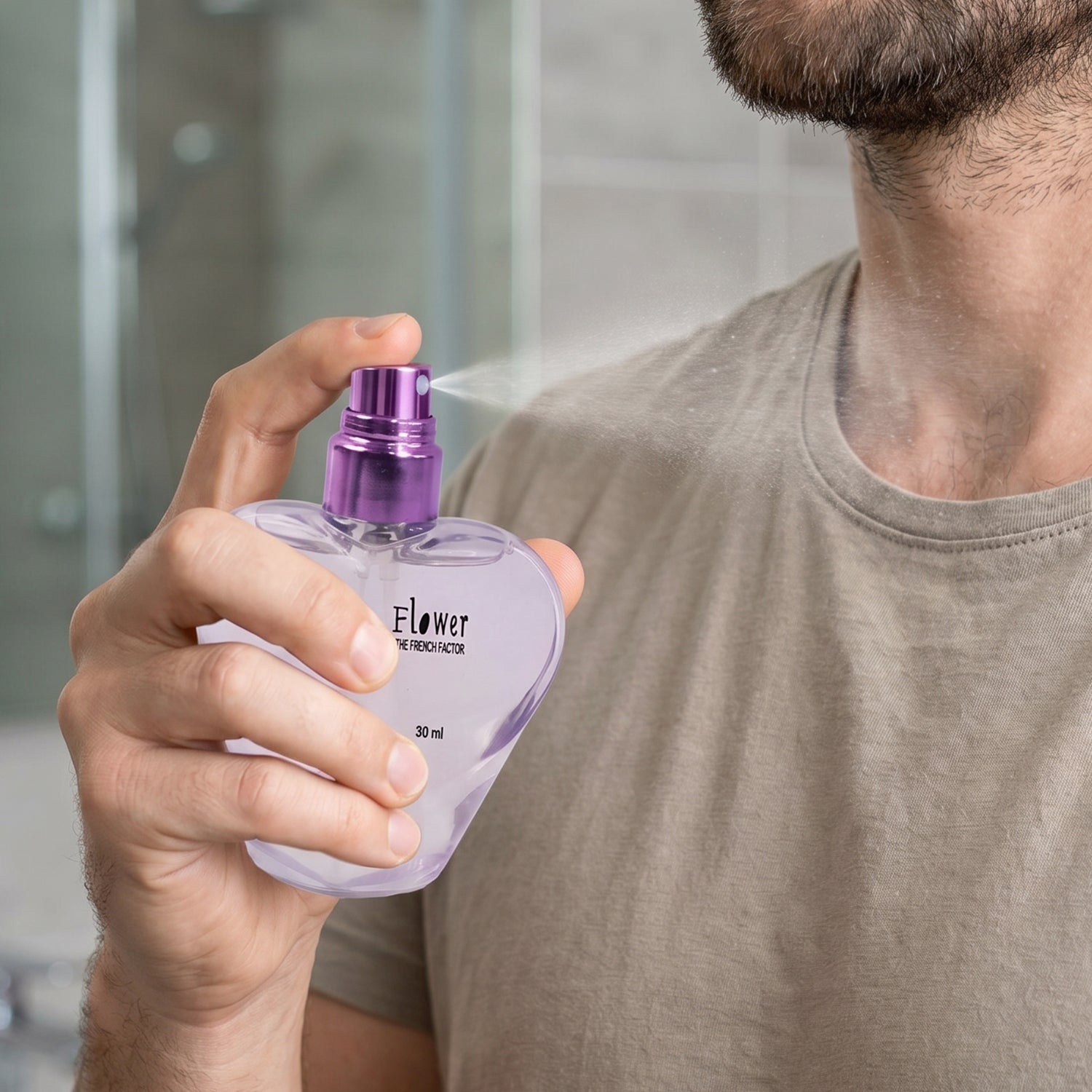 Stylish perfume spray bottle with floral design