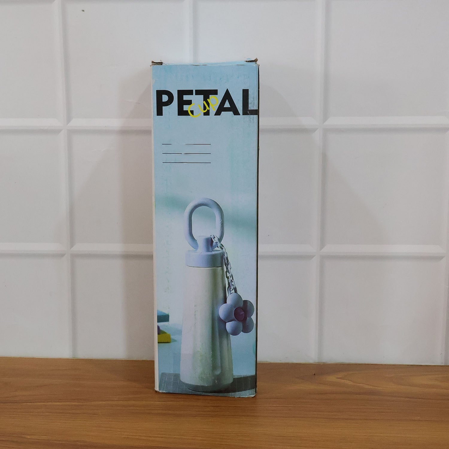 450ML portable water bottle placed in a natural outdoor setting