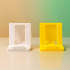 Foldable plastic phone stand laid flat for storage