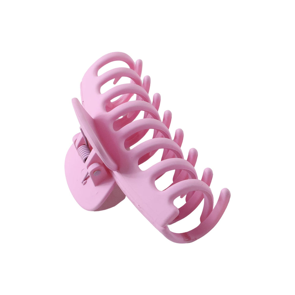 Durable pink hair claw clip holding hair securely