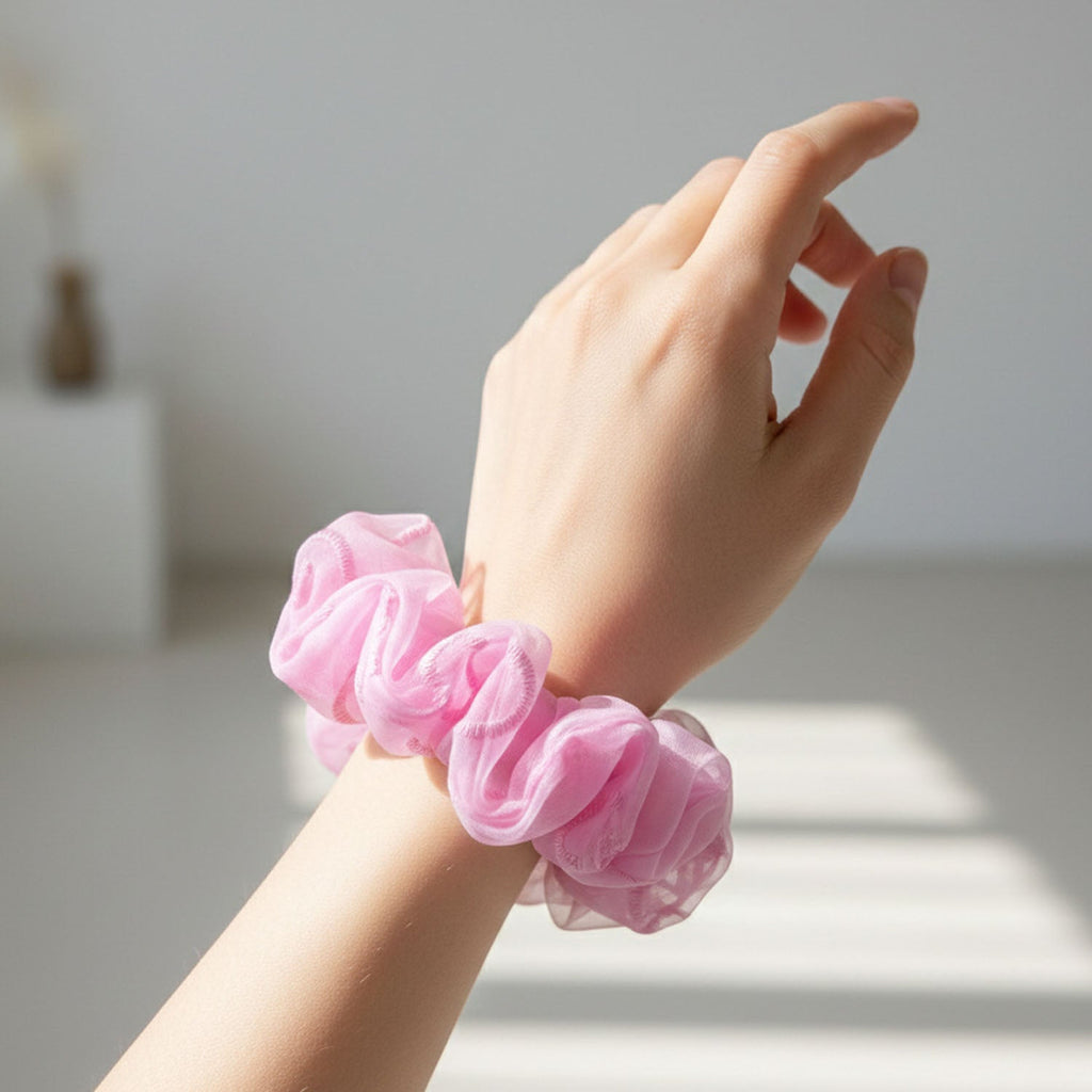 Pink elastic hair tie accessory for everyday hairstyling needs